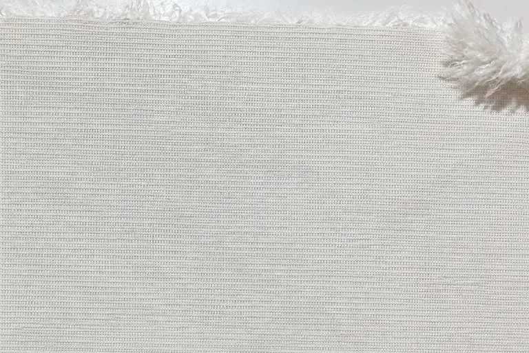 Sheared Curly Lamb Faux Fur Fabric - knitted backing