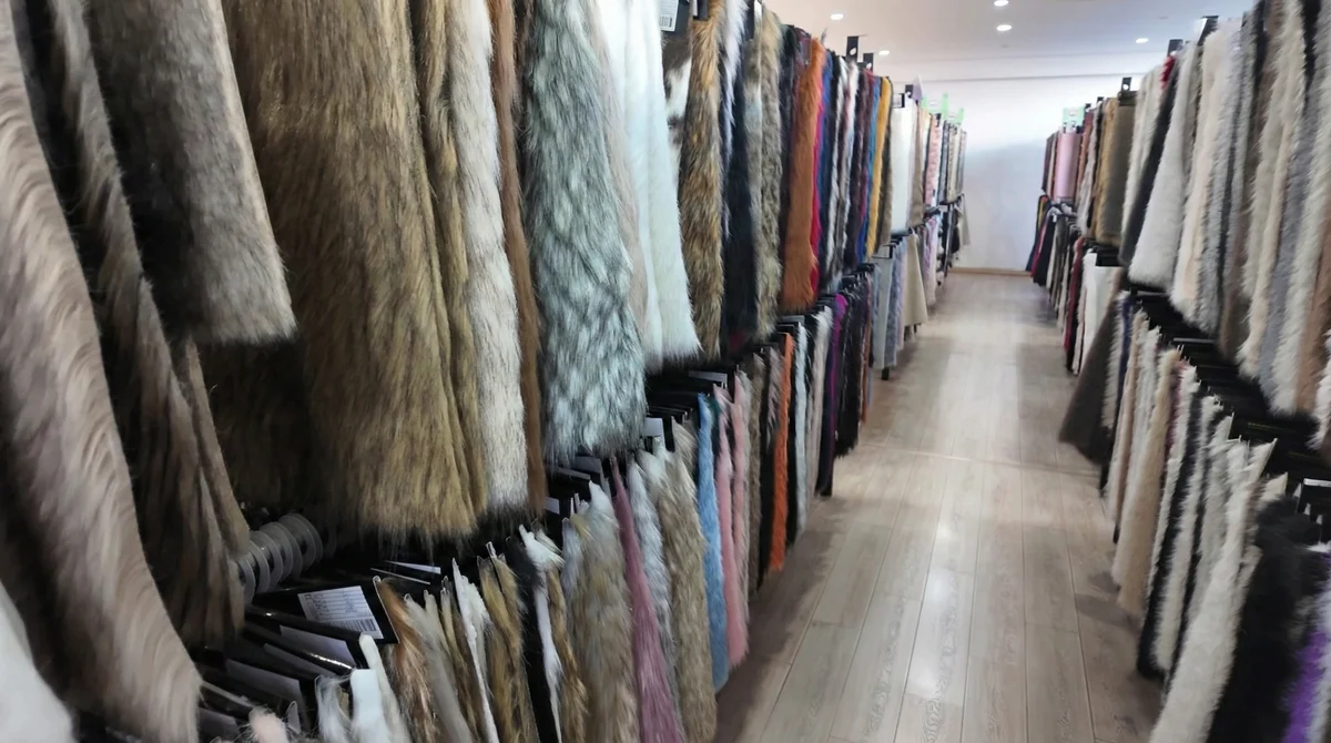 Rows of faux fur fabric samples in the IPO fabric showroom