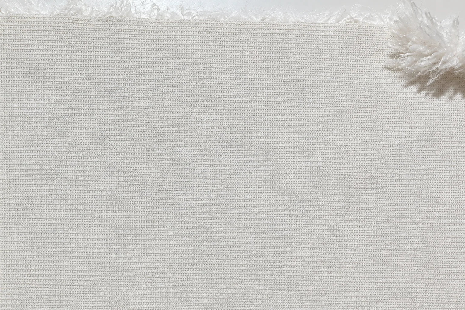 Sheared Curly Lamb Faux Fur Fabric - knitted backing